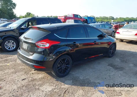 2015 Ford Focus Titanium from USA, damaged, VIN 1FADP3N29FL247491